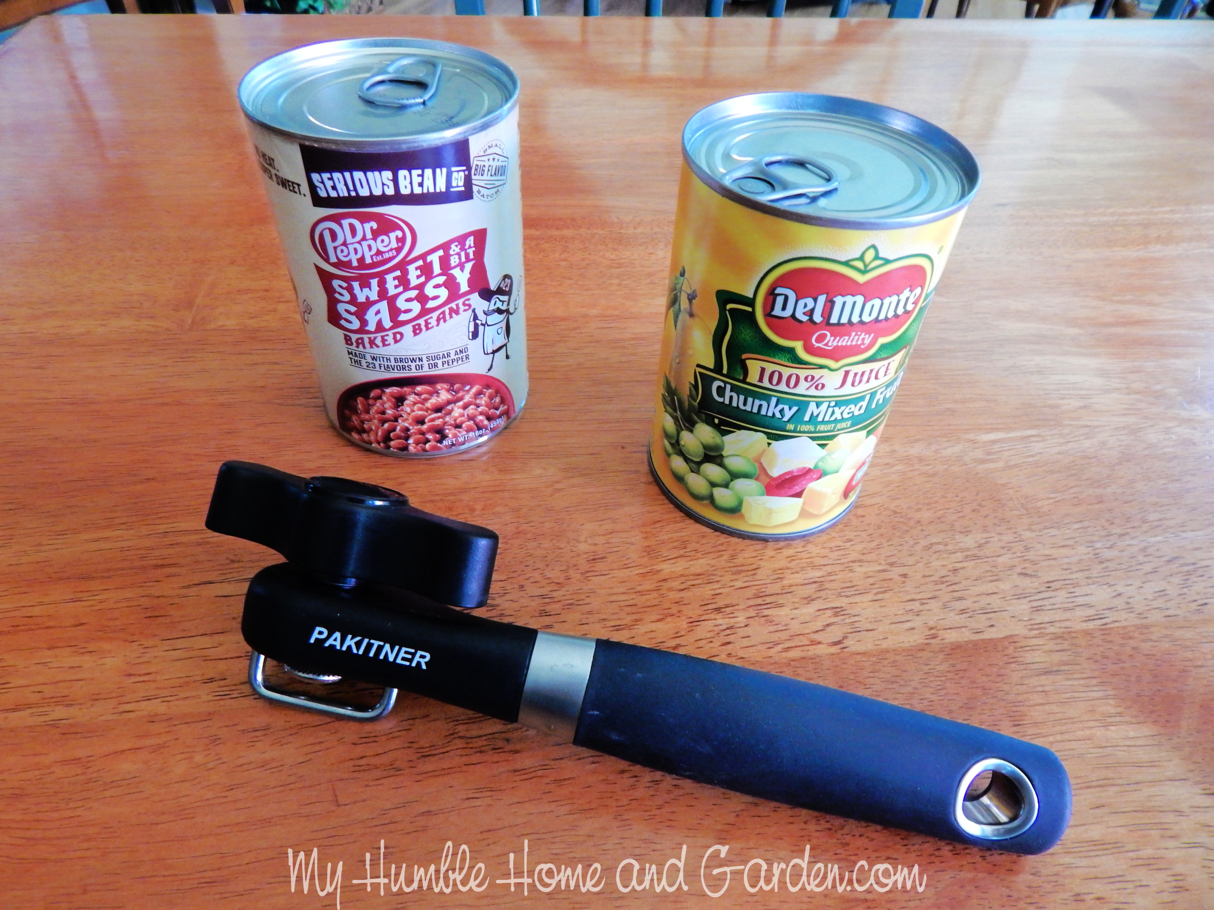 Remove the top of a soda can with a can opener! Smooth edged